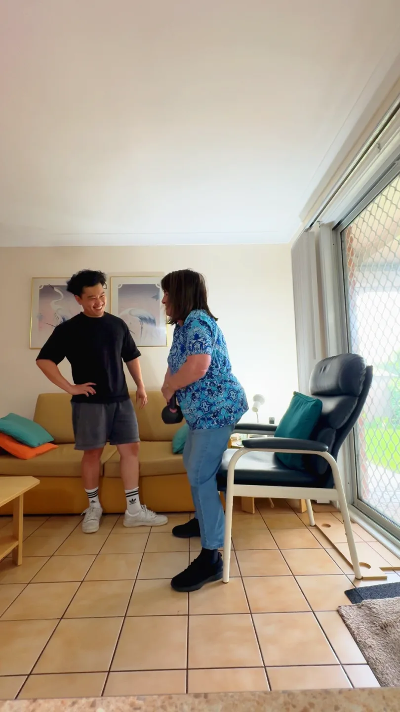 An adult participant completing a strength exercise with a Drift Health therapist at home