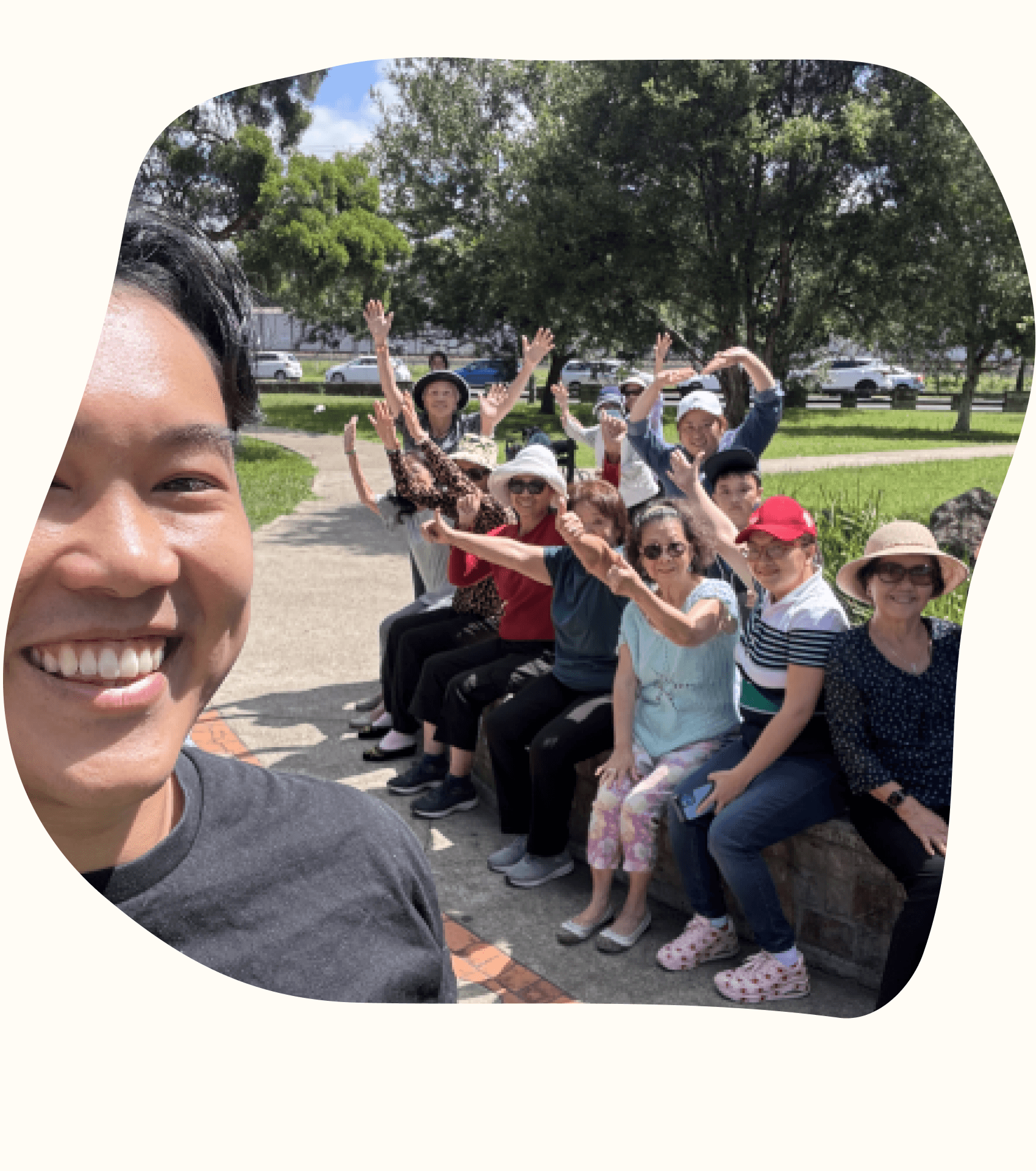 Victor with a group of older adults on a park outing